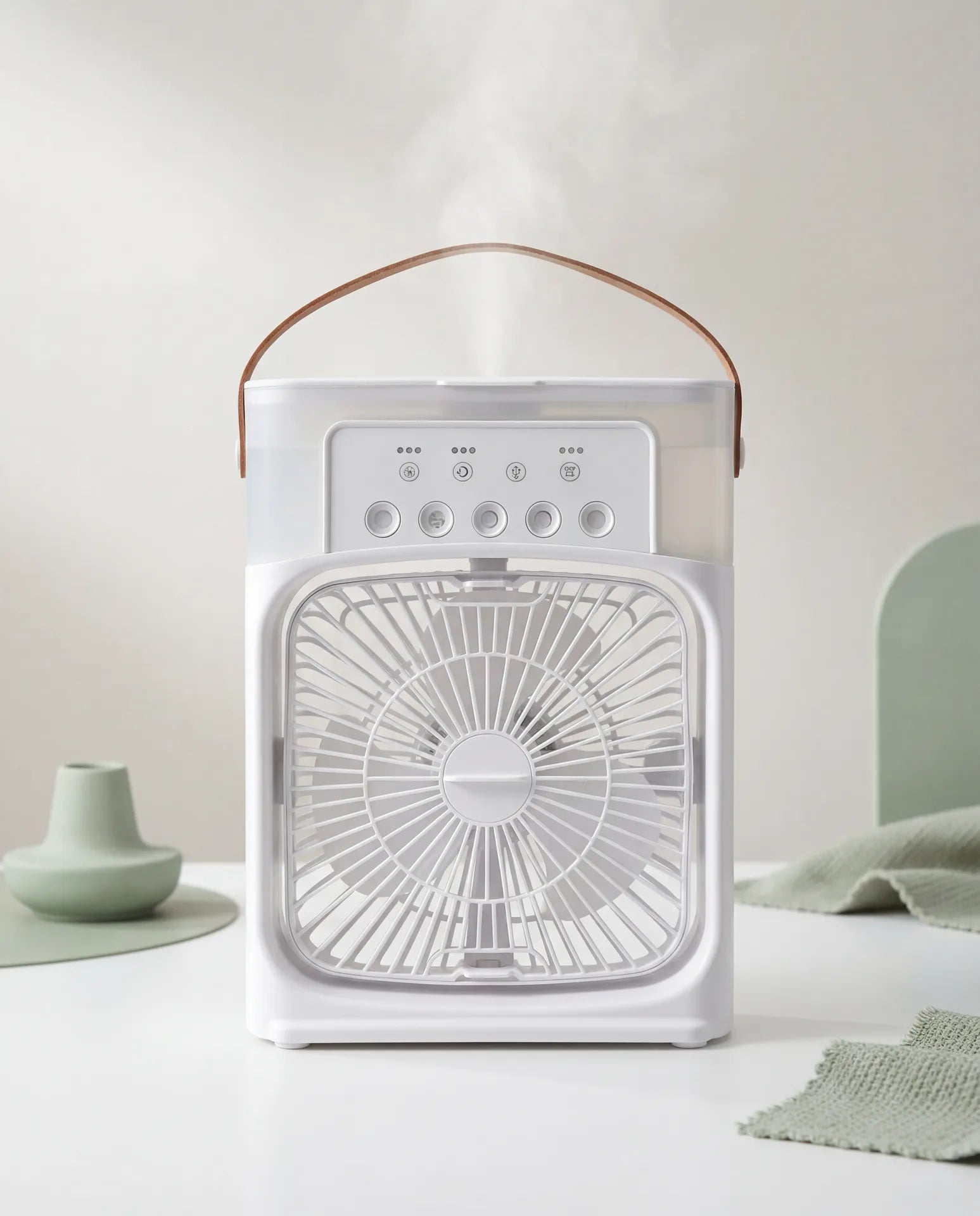 USB mist fan on clean light studio background